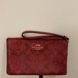 Gently used Coach Wristlet.